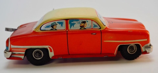 HPZ Prottengeier Sedan with driver 1955 Tinmodel with frictiondrive in original box (5694)